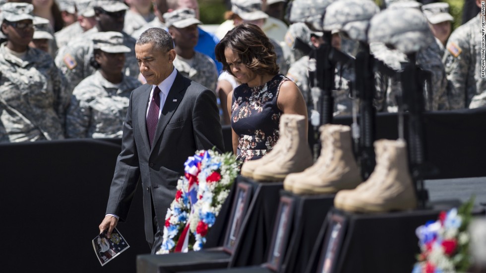 Obama and first lady Michelle Obama arrive for a memorial service in Fort Hood, Texas, in April 2014. Officials say Army Spc. Ivan Lopez took a .45-caliber handgun onto the military post, killing three people and injuring 16 before taking his own life.