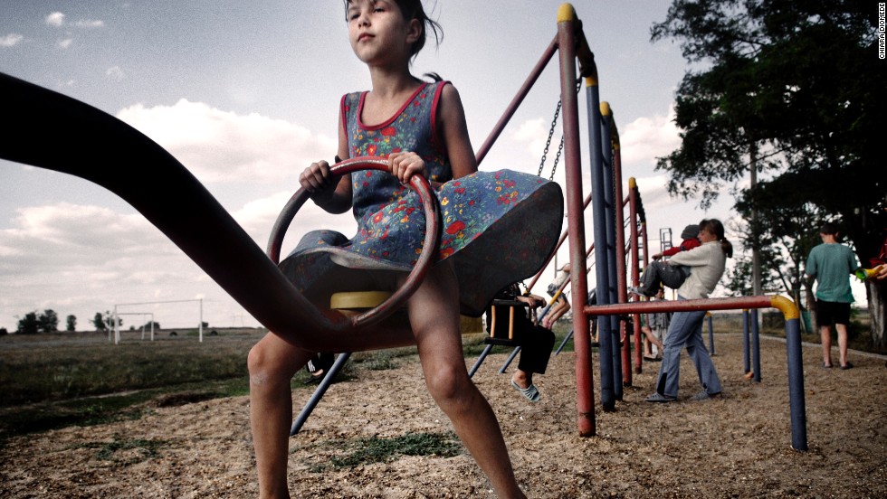 A child enjoys a Transnistrian playground.