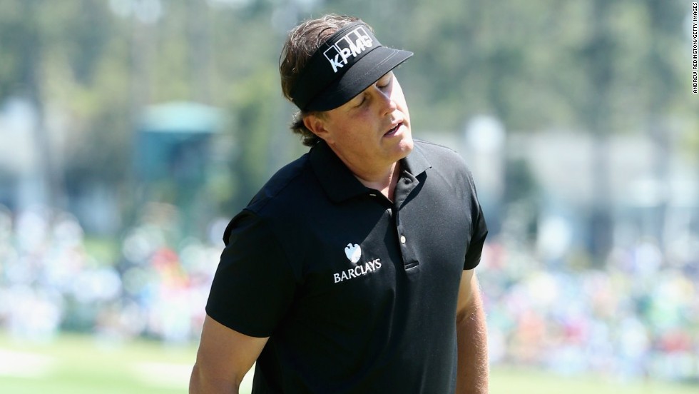 Phil Mickelson is seeking a fourth title at Augusta but struggled at the seventh hole, hitting a triple bogey. 