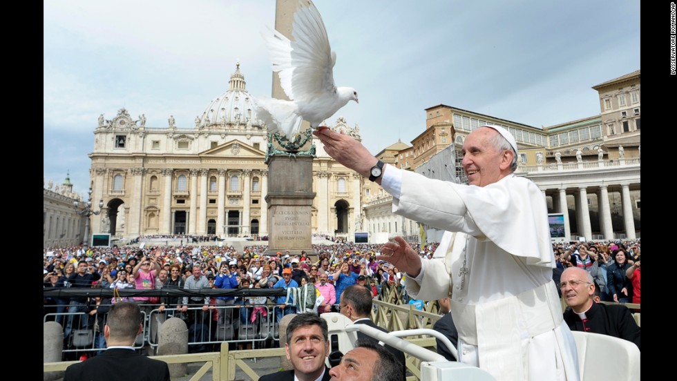 Francis frees a dove in May 2013 during his weekly general audience in St. Peter&#39;s Square.