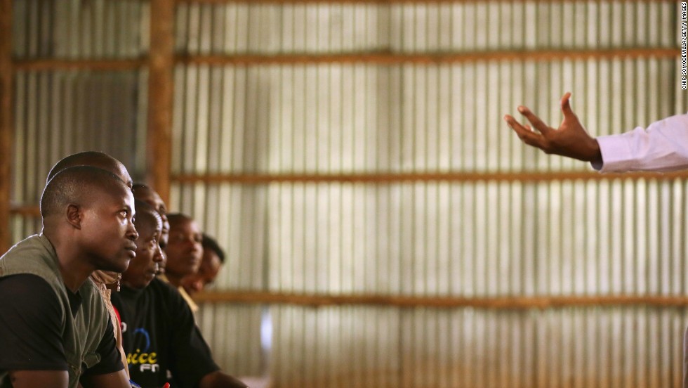 Teacher Alphonse Senyoni leads a class on history, politics and the 1994 genocide for former Democratic Forces for the Liberation of Rwanda combatants in Mutobo on April 10.