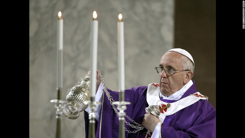 The Pope blesses the altar at Rome&#39;s Basilica of Santa Sabina as he celebrates Mass on Ash Wednesday in March 2014.