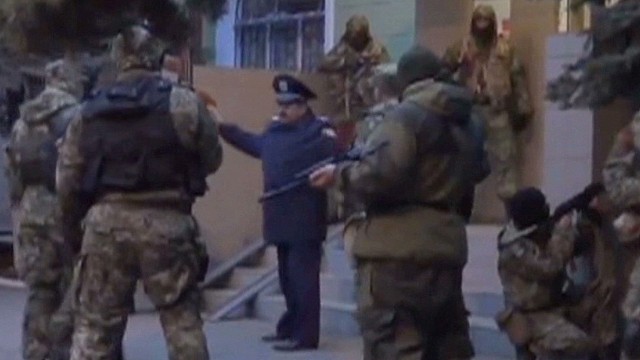 Armed pro-Russians storm police station