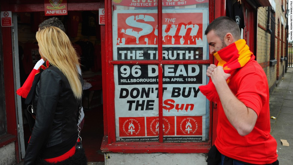 A poster protesting about the way in which Liverpool fans were blamed for the Hillsborough disaster is displayed outside Anfield in 2012. The club&#39;s supporters boycotted &quot;The Sun&quot; newspaper due to its coverage of the deaths.