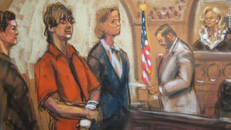Tsarnaev stands in court, flanked by his lawyers, in this sketch from July 2013.
