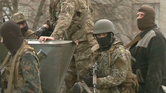 Ukrainian troops face militants in east