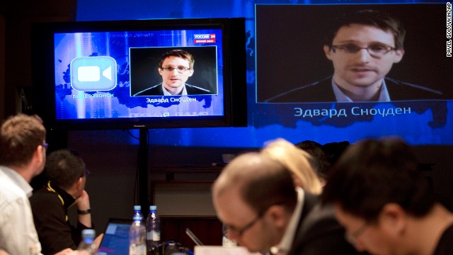 Snowden questions Putin on camera