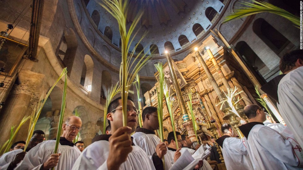 Roman Catholics celebrate at the Church of the Holy Sepulchre in Jerusalem on April 14.