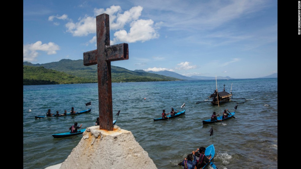 Catholic worshippers perform a sea procession to transfer a statue of Jesus Christ from one church to another April 18 in Larantuka, Indonesia.