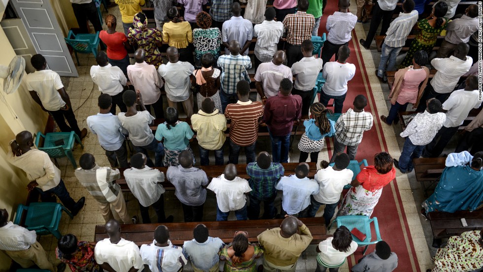 Catholics pray for peace during a religious ceremony in Juba on Sunday, February 23.