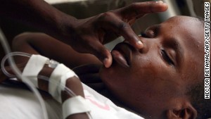 Cholera Outbreak Roils Haiti as Violence Hampers Aid Workers - BNN Bloomberg