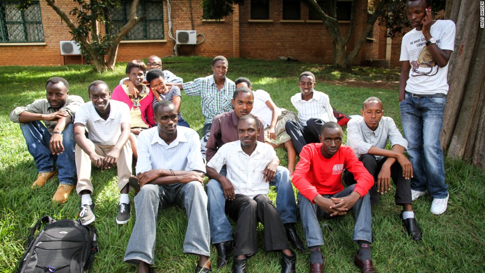 Twenty-three-year-old Jean Clude Nkusi (bottom left) has been elected as the father of the Urumuri family, which numbers 24 children -- some of them are pictured here at the University of Rwanda College of Education in Kigali.