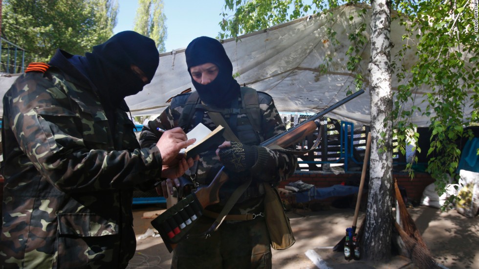 Pro-Russia militants keep records of their duty in Slovyansk on April 25.