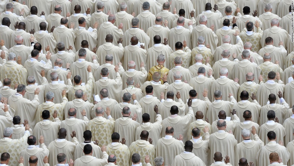 Priests attend the canonization Mass for Popes John XXIII and John Paul II at the Vatican on April 27.