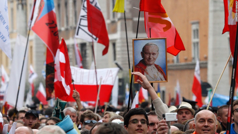 Pilgrims crowd St. Peter&#39;s Square to attend the ceremony for the canonizations of Pope John XXIII and Pope John Paul II on April 27.