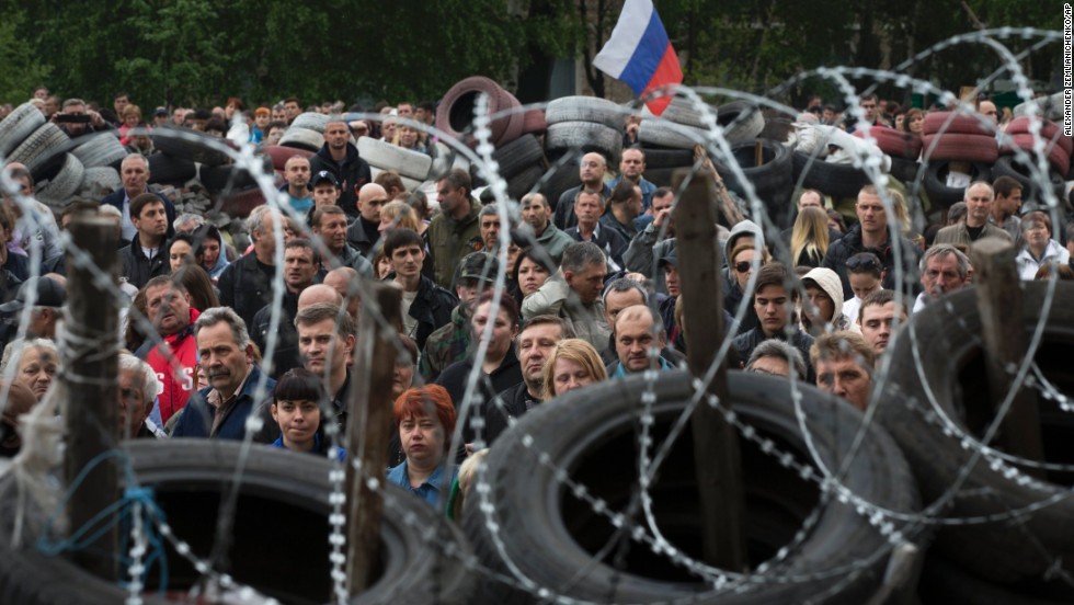 Pro-Russian protesters gather in Donetsk to honor the memory of comrades who died in Odessa.