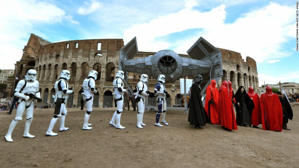 Members of the &quot;Star Wars&quot; fan club celebrate May 4 (&quot;Star Wars Day&quot;) in front of the Colosseum in central Rome. Why May 4? It&#39;s related to a pun on &quot;May the Force be with you&quot; -- &quot;May the Fourth be with you.&quot;