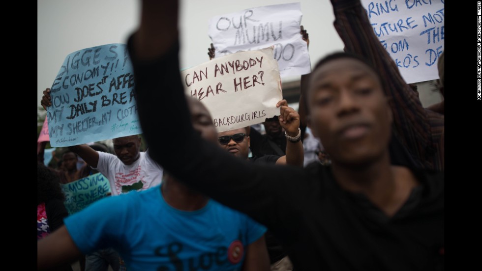 People rally in Lagos on Thursday, May 1.