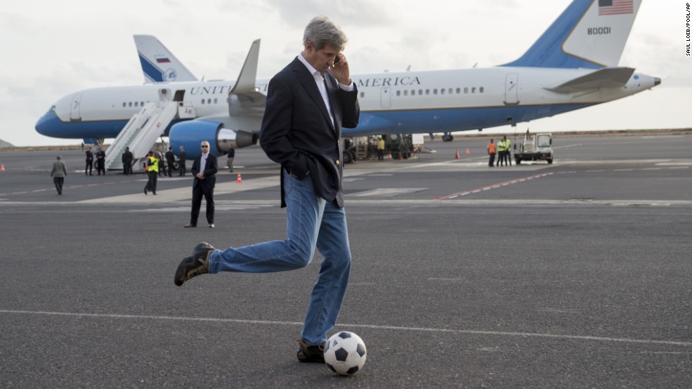 Kerry kicks around a soccer ball during an airplane refueling stop at Sal Island, Cape Verde, on Monday, May 5, 2014. Kerry was on his first major tour of Africa, focusing on some of the continent&#39;s most brutal conflicts.