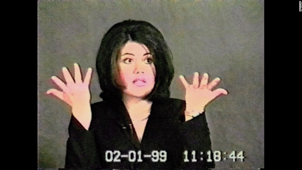 Lewinsky gestures during her deposition in a video shown during Clinton&#39;s impeachment trial in 1999.