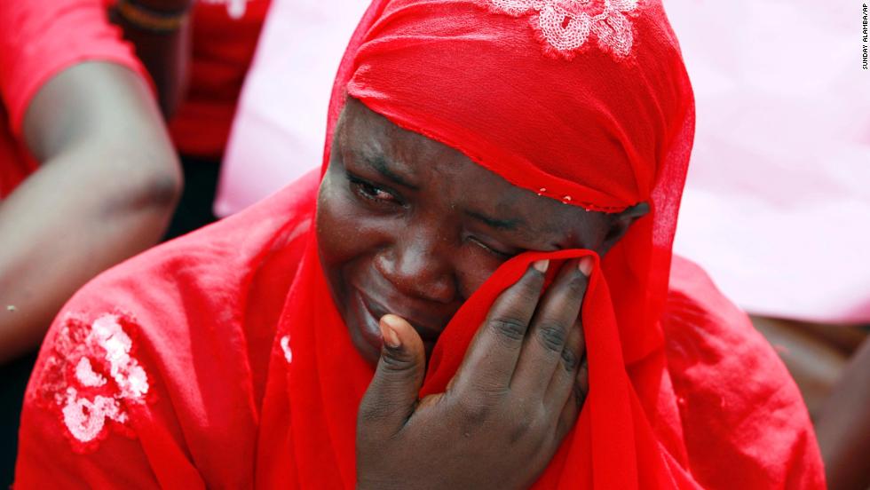 A woman attends a demonstration Tuesday, May 6, that called for the Nigerian government to rescue the girls.