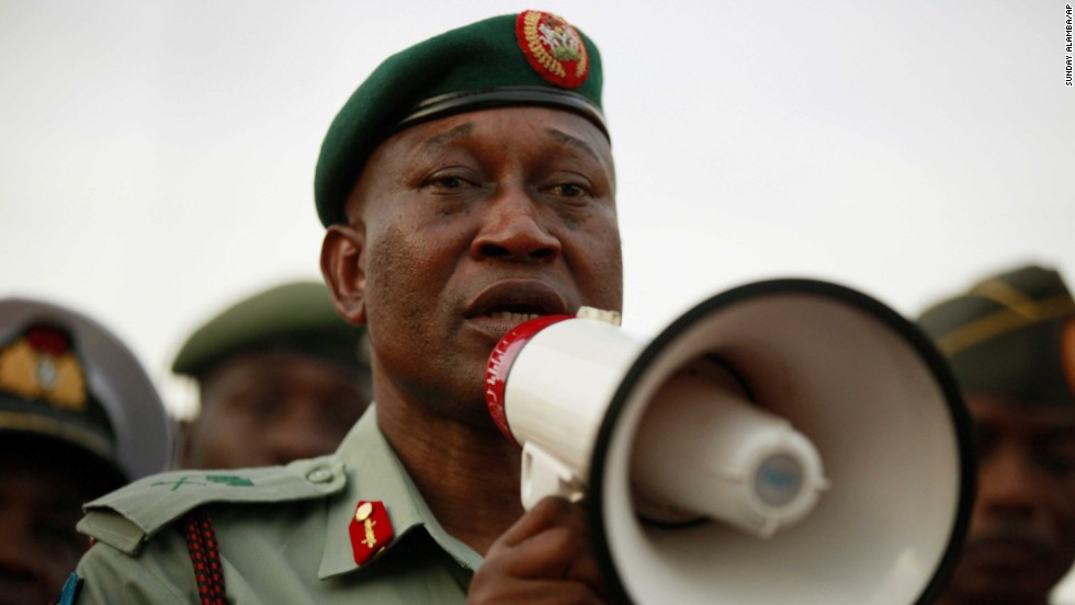 Brig. Gen. Chris Olukolade, Nigeria&#39;s top military spokesman, speaks to people at a demonstration May 6 in Abuja.