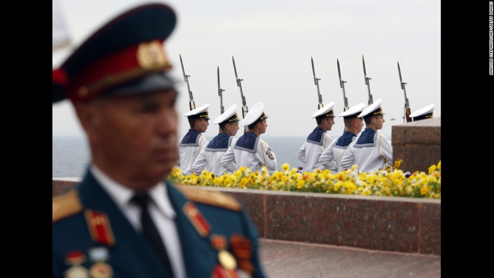 Sailors take part in a Victory Day ceremony at the Unknown Sailor Memorial in Odessa, Ukraine.