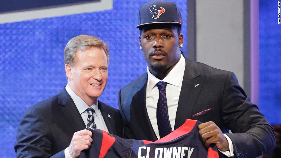 Jadeveon Clowney and NFL Commissioner Roger Goodell hold up a jersey after Clowney was taken by the Houston Texans with the first pick in the NFL Draft on Thursday, May 8, in New York. Clowney played defensive end at the University of South Carolina.