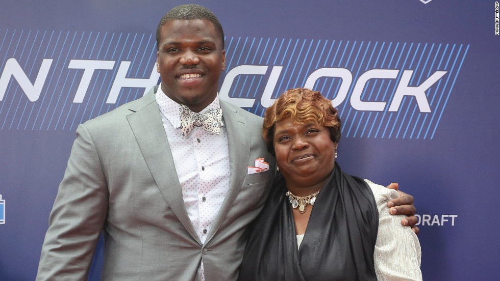 Greg Robinson, an offensive tackle from Auburn who went second overall to the St. Louis Rams, poses with his mother, Rhonda. 
