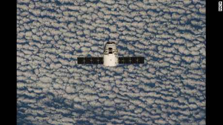 ISS039-E-013373 (20 April 2014) --- This is one of an extensive series of still photos documenting the arrival and ultimate capture and berthing of the SpaceX Dragon at the International Space Station, as photographed by the Expedition 39 crew members onboard the orbital outpost. The spacecraft was captured by the space station and successfully berthed, following the April 20 arrival.   The SpaceX Dragon arrives at the International Space Station on April 20, 2014. In 2012, the Dragon became the first private spacecraft to dock with the space station. It carries up cargo and brings back trash. SpaceX hopes to take crew members to the space station in the future.