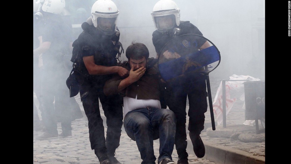 Police arrest a protester in Ankara on May 14.