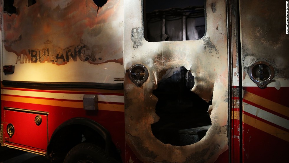 A destroyed New York City Fire Department ambulance from ground zero is on display.