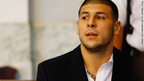 NORTH ATTLEBORO, MA - AUGUST 22: Aaron Hernandez sits in the courtroom of the Attleboro District Court during his hearing on August 22, 2013 in North Attleboro, Massachusetts. Former New England Patriot Aaron Hernandez has been indicted on a first-degree murder charge for the death of Odin Lloyd. (Photo by Jared Wickerham/Getty Images)