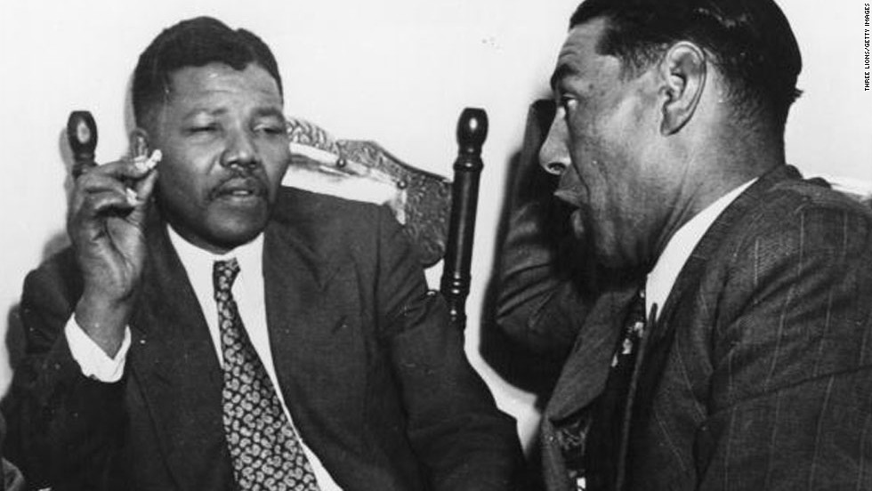 &lt;a href=&quot;http://www.cnn.com/SPECIALS/africa/nelson-mandela/index.html&quot;&gt;South African resistance leader Nelson Mandela&lt;/a&gt;, left, talks to Cape Town teacher C Andrews in 1964. On June 12, 1964, Mandela was sentenced to life in prison for four counts of sabotage. He was released 27 years later, and when apartheid ended he became the country&#39;s first black president.