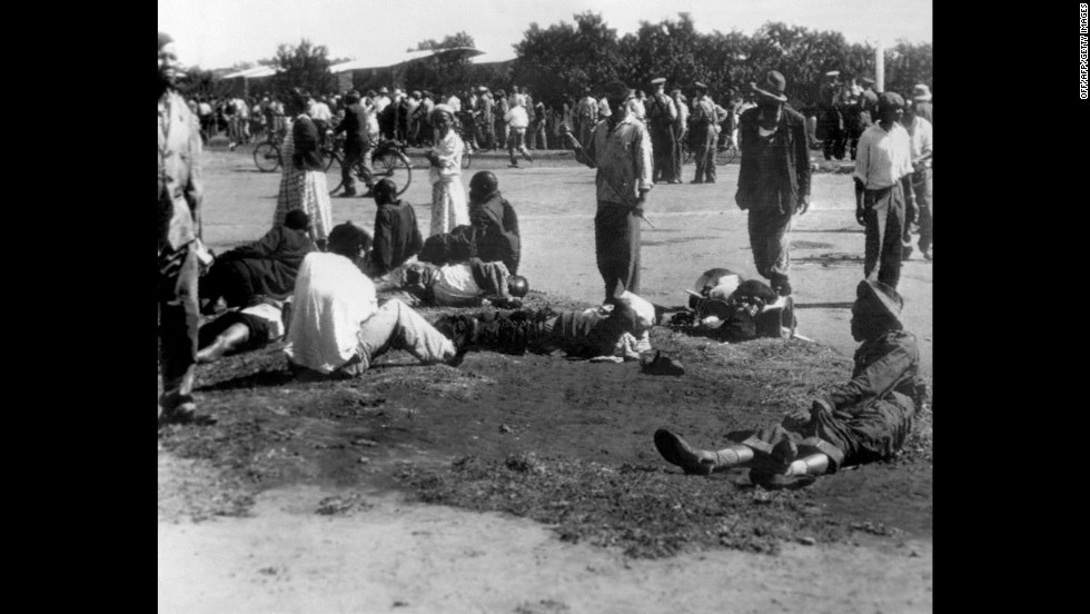 Wounded people in South Africa&#39;s Sharpeville township lie in the street on March 21, 1960, after police opened fire on black demonstrators marching against the country&#39;s segregation system known as apartheid. At least 180 black Africans, most of them women and children, were injured and 69 were killed in the Sharpeville massacre that signaled the start of armed resistance against apartheid.