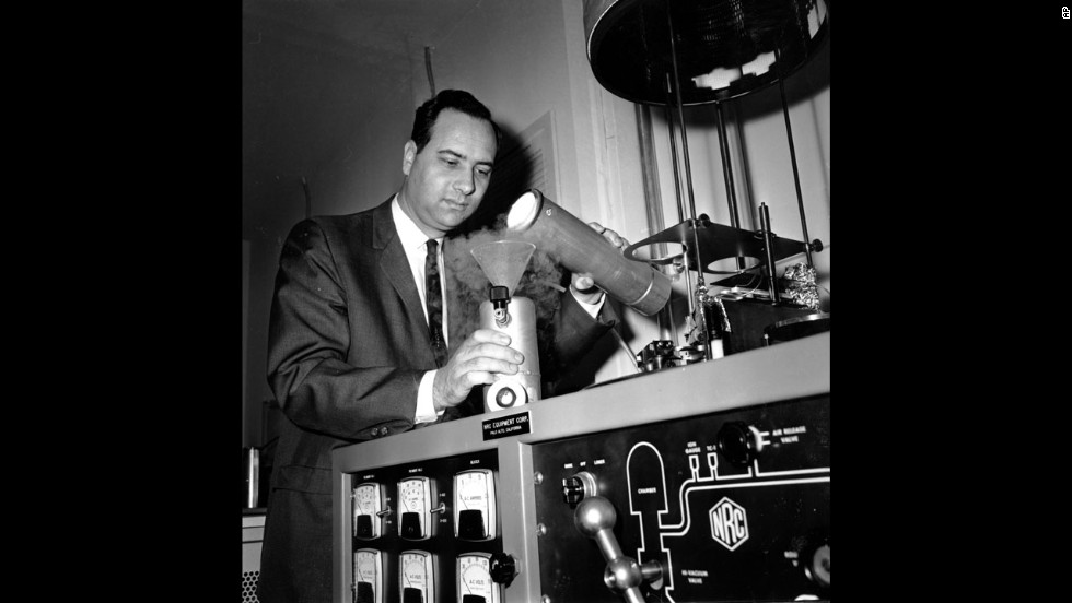 Theodore Maiman pours liquid nitrogen into a cooling unit around one of the first experimental lasers in his laboratory in Santa Monica, California. Maiman&#39;s ruby laser, created on May 16, 1960, is considered to be one of the top technological achievements of the 20th century. It paved the way for fiber-optic communications, CDs, DVDs and sight-restoring surgery.  