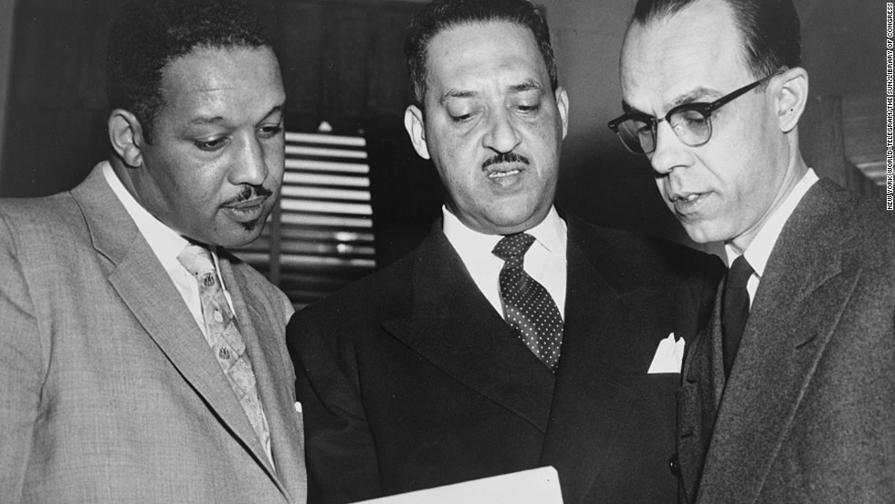 From left, lead lawyers Harold P. Boulware, Thurgood Marshall and Spottswood W. Robinson III confer at the US Supreme Court prior to presenting arguments in 1953. Marshall, the NAACP&#39;s Special Counsel and lead counsel for the plaintiffs, argued the case before the Supreme Court.