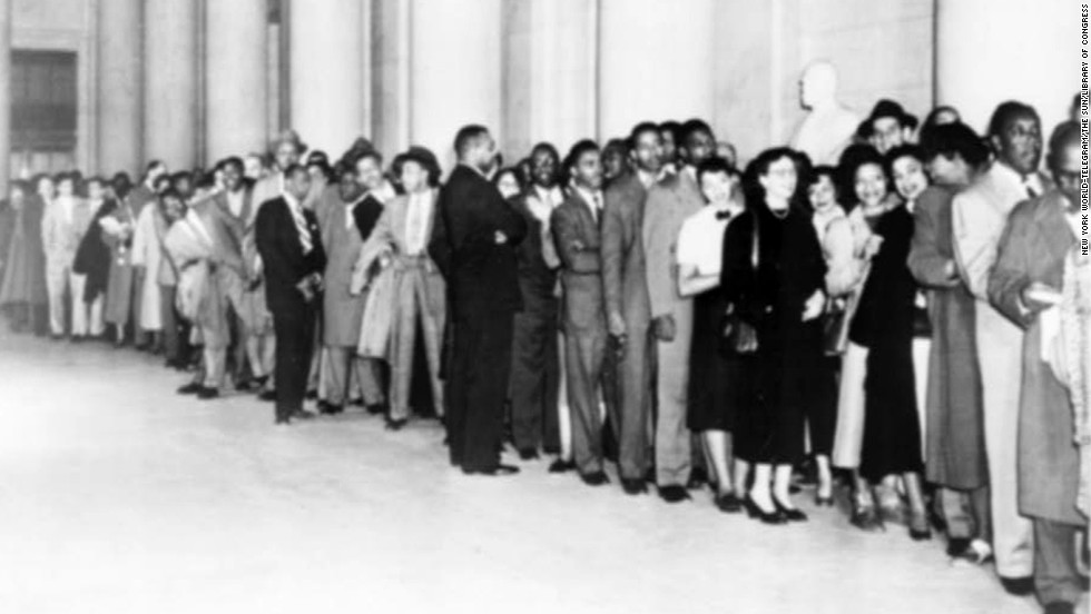 People wait in line outside the Supreme Court during the hearings in 1953. 