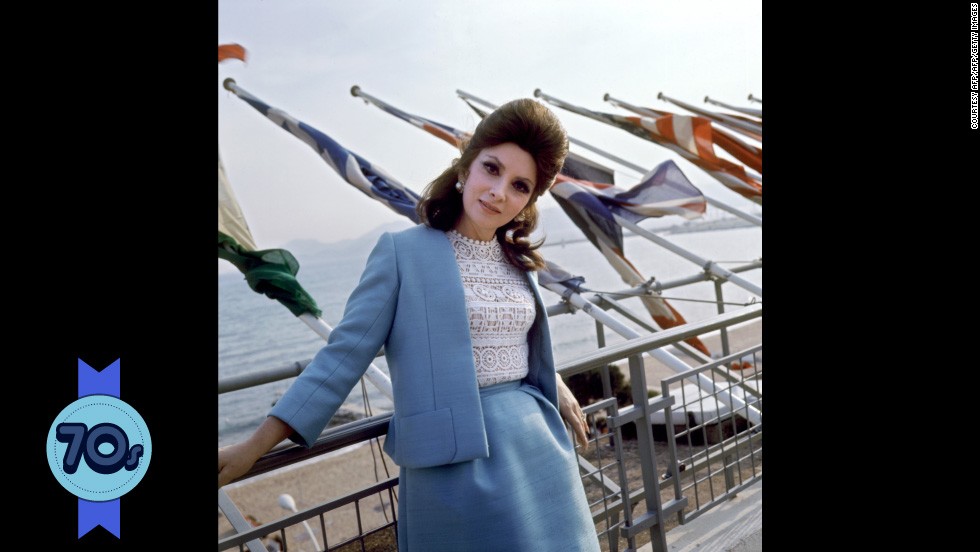 Italian actress Gina Lollobrigida contrasts a demure powder blue suit with racy lace on top at Cannes in 1972. She starred in films such as &quot;The Hunchback of Notre Dame&quot; (1956) but as her career slowed, she established herself as a photojournalist and sculptor, even gaining an exclusive interview with Communist dictator Fidel Castro.  