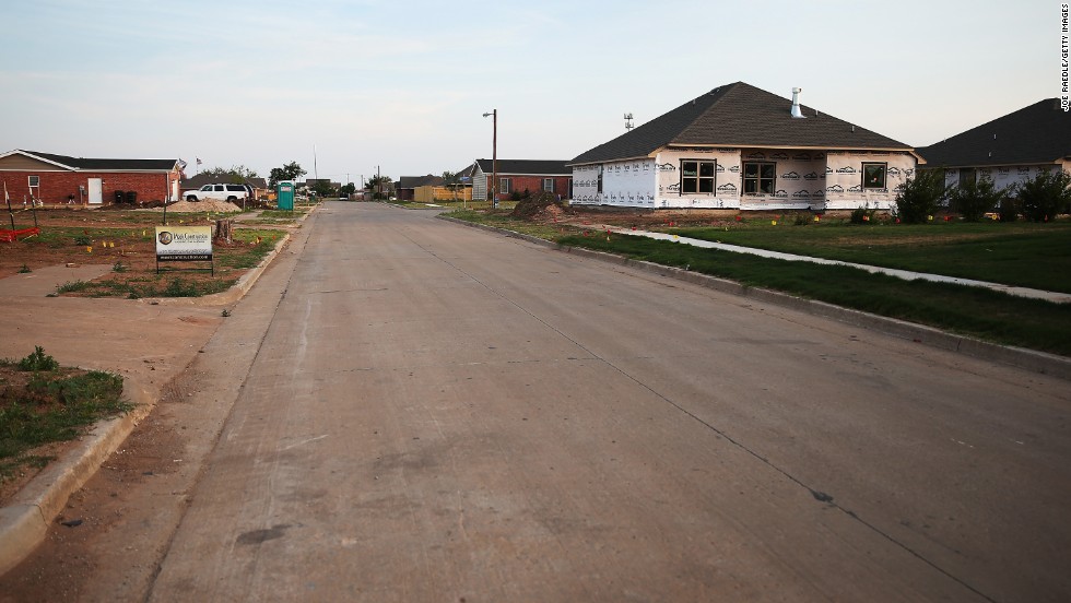 &lt;strong&gt;Now:&lt;/strong&gt; Construction continues along the residential street on May 18, 2014.