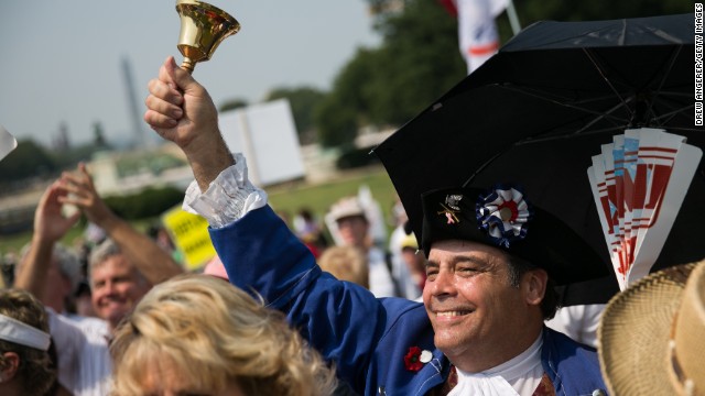 In this September 10, 2013, file photo, tea party activists cheer during a rally in Washington.