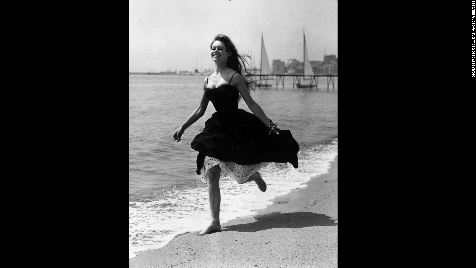 Film star Brigitte Bardot eschews footwear altogether and runs barefoot on a beach in Cannes during the 1956 festival, where &quot;The Silent World&quot; by Jacques-Yves Cousteau and Louis Malle won the Palme d&#39;Or. 