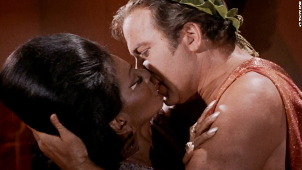 In the &quot;Plato&#39;s Stepchildren&quot; episode of &quot;Star Trek,&quot; which aired November 22, 1968, William Shatner (as Capt. Kirk) and Nichelle Nichols (as Lt. Uhura) kissed -- the first interracial kiss in TV history. The medium grappled cautiously with race relations through the decade. 