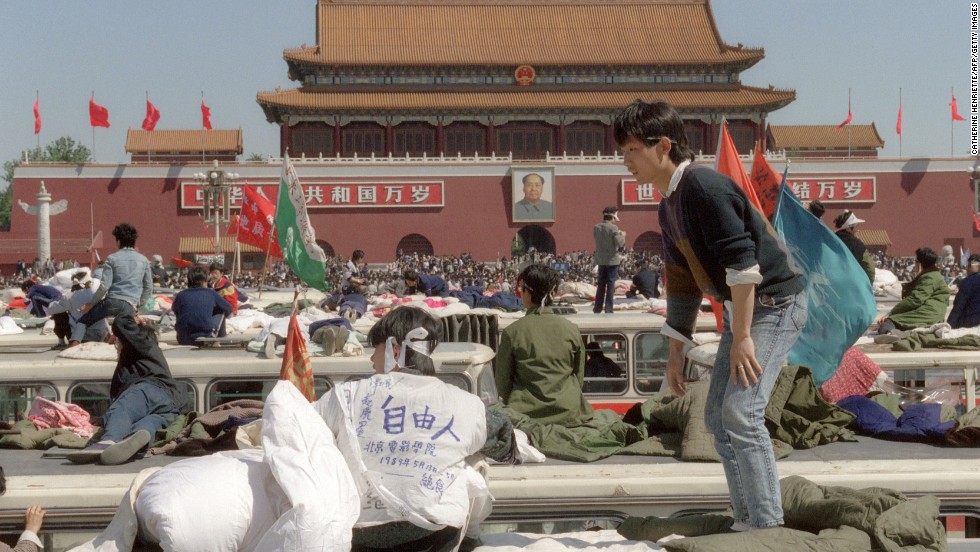 Student hunger strikers camp out on top of buses parked at Tiananmen Square.
