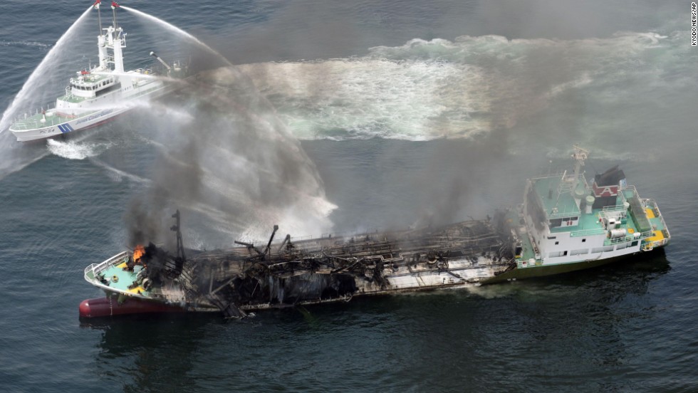 Japanese Coast Guard ships fight a fire after an Japanese oil tanker exploded.