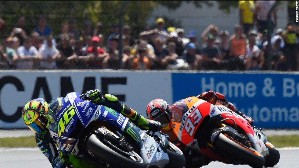 Introducing &quot;The Doctor&quot; of MotoGP -- Valentino Rossi briefly leads Marc Marquez at the French MotoGP on 18 May 2014.