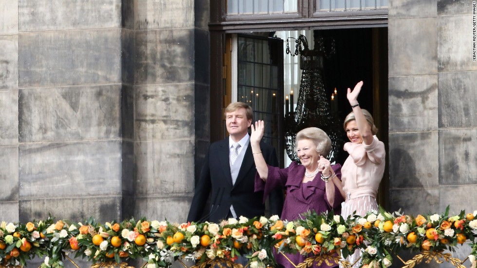 Beatrix of the Netherlands, center, greets the public on the balcony of Amsterdam&#39;s Royal Palace after her abdication in April 2013. She spent 33 years as the Dutch Queen before handing over power to son Willem-Alexander, left.