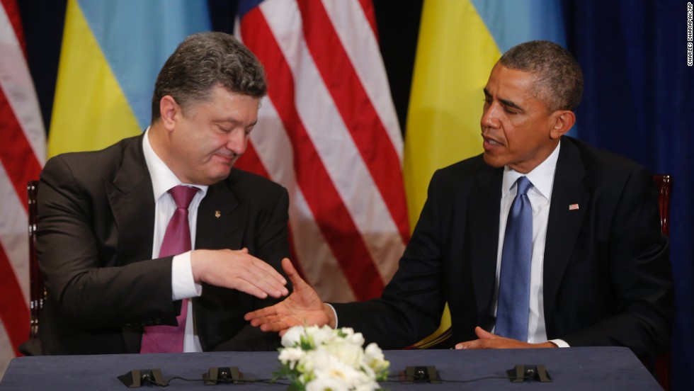Obama meets with Ukrainian President-elect Petro Poroshenko in Warsaw on June 4. Obama voiced his support for Poroshenko and called for the international community to &quot;stand solidly behind&quot; him as his government tries to quell a pro-Russian separatist uprising in the country&#39;s east.