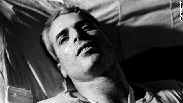 This picture taken in 1967 shows McCain lying on a bed in a Hanoi hospital. 