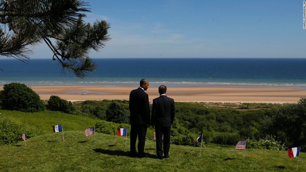 President Obama and French President Francois Hollande survey Omaha Beach on June 6.